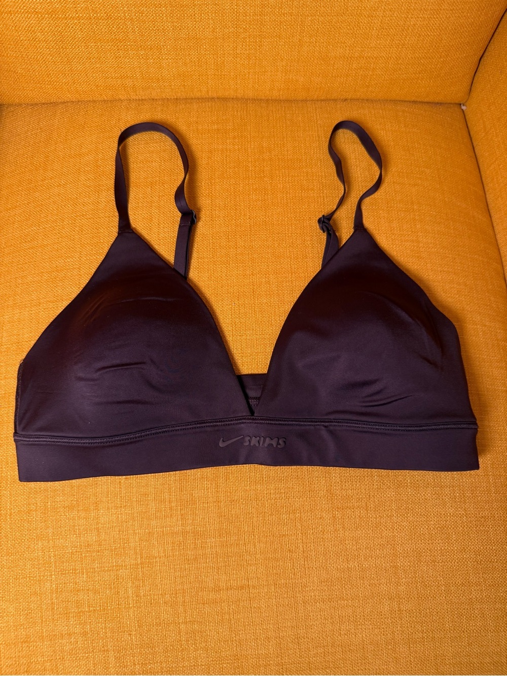 SKIMS Wireless Triangle Bra in Dark Plum